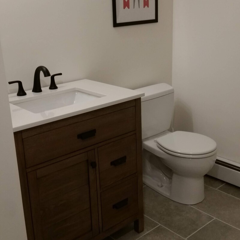 New toilet & vanity installed.